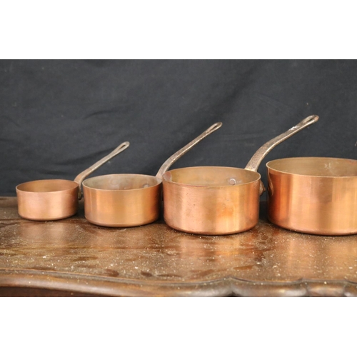 418 - Set of antique French copper saucepans, approx 10cm H x 20cm Dia ex handle and smaller