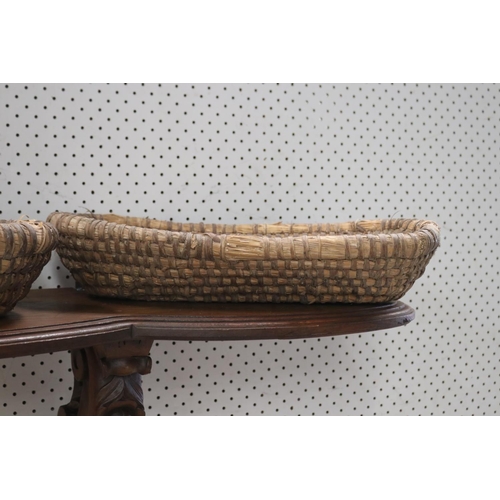 426 - Set of three woven fibre baskets, approx 8cm H x 49cm W x 25cm D and smaller (3)
