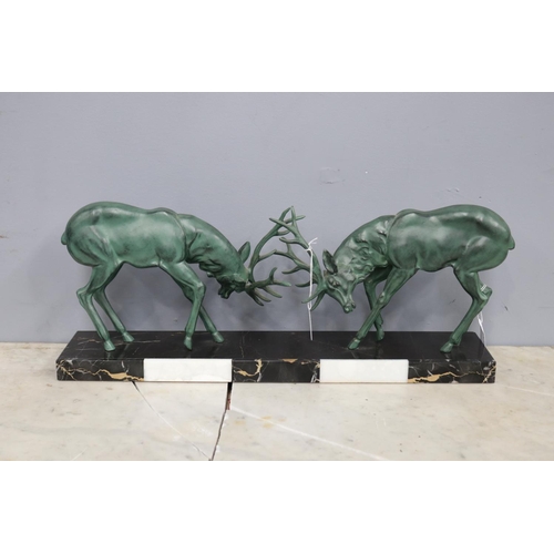 441 - French sculpture of two stags engaged in rutting fight , standing on multi tone onyx base, approx 22... 