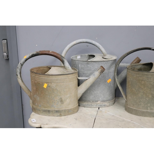 444 - Three French rustic gal metal watering cans, approx 42cm H x 56cm W and smaller (3)