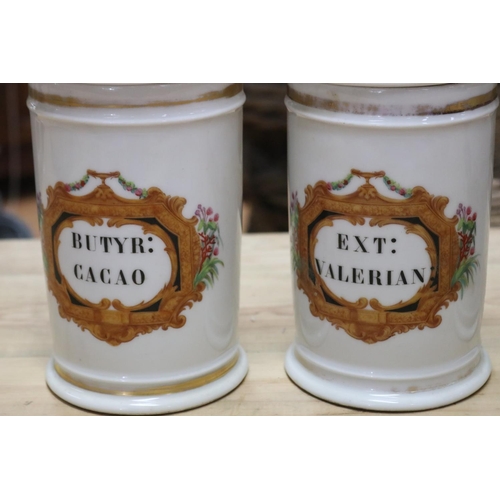 464 - Set of three antique French Paris porcelain lidded chemist jars, each approx 27cm H (3)