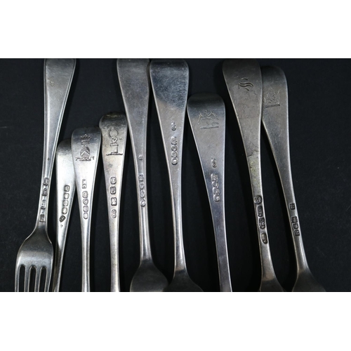 1059 - Nine hallmarked sterling silver forks, various dates and makers, approx 475 grams & approx 20.5cm L ... 