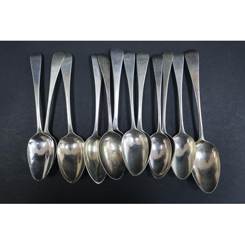 1075 - Twelve Georgian hallmarked sterling silver spoons, various dates and makers, approx 380 grams & 20cm... 