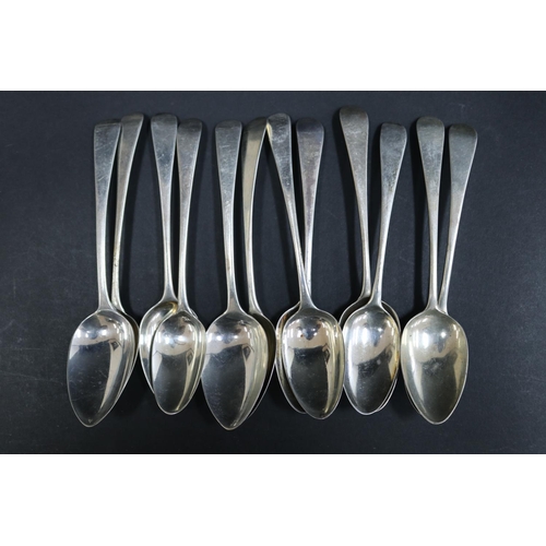 1077 - Twelve Georgian hallmarked sterling silver spoons, various dates and makers, approx 345 grams & appr... 