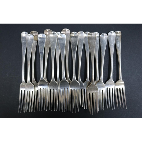 1084 - Seventeen Georgian, William IV and later hallmarked sterling silver dinner forks, approx 1105 grams ... 