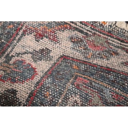 381 - Handwoven wool carpet, approx 133cm x 200cm