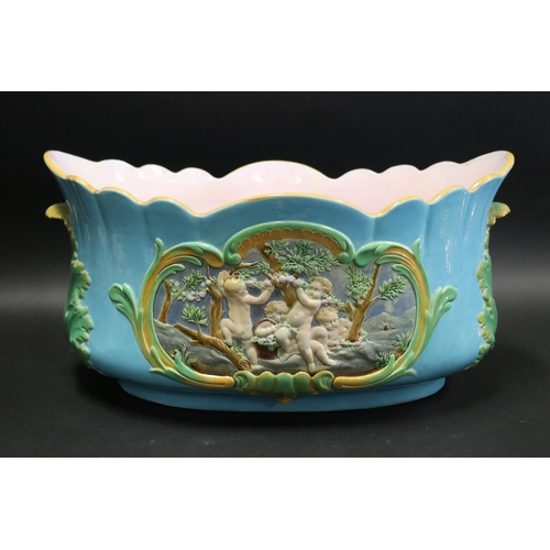 54 - Large antique 19th century likely French majolica jardiniere, of oval elongated shape, with scallope... 