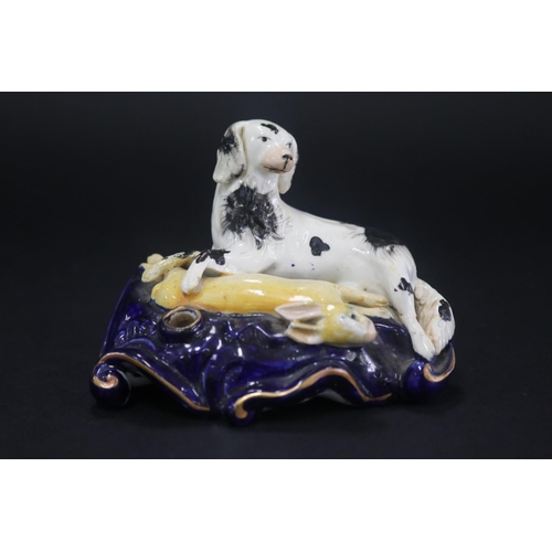 5092 - Antique Staffordshire figural spill vase, showing dog & hare, has damages, approx 7cm H x 12cm W