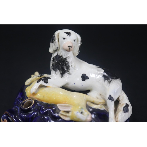 5092 - Antique Staffordshire figural spill vase, showing dog & hare, has damages, approx 7cm H x 12cm W