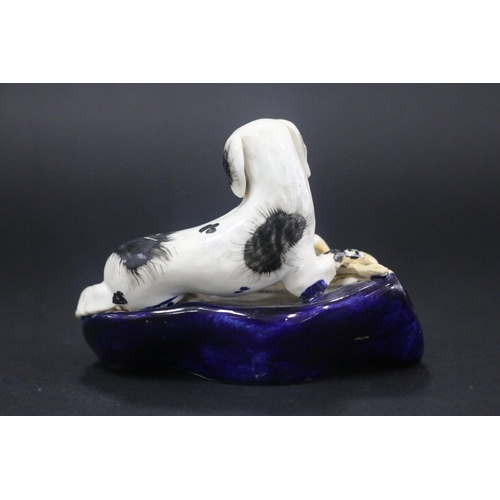 5092 - Antique Staffordshire figural spill vase, showing dog & hare, has damages, approx 7cm H x 12cm W