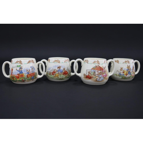 5105 - Royal Doulton, Bunnykins twin handled cups, approx 7.5cm H each (8)