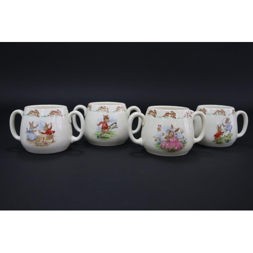 5105 - Royal Doulton, Bunnykins twin handled cups, approx 7.5cm H each (8)