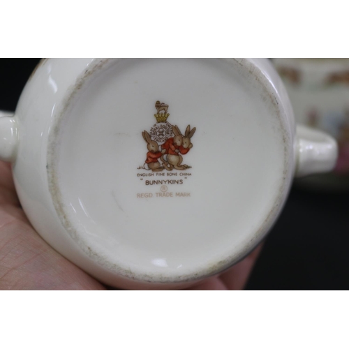 5105 - Royal Doulton, Bunnykins twin handled cups, approx 7.5cm H each (8)