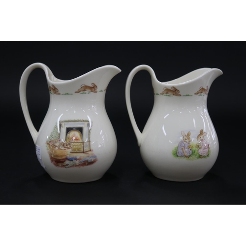 5121 - Royal Doulton, Bunnykins two milk jugs, approx 12cm H each (2)