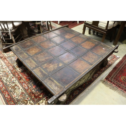 400 - Large Indian cart top coffee table, with applied hand beaten brass and steel decoration, approx 41cm... 