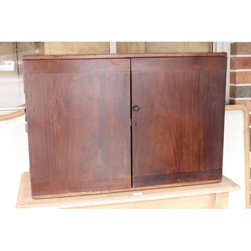 388 - Antique mahogany campaign stationary two door cabinet, fitted with two small internal drawers, iron ... 