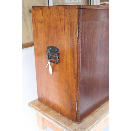 388 - Antique mahogany campaign stationary two door cabinet, fitted with two small internal drawers, iron ... 