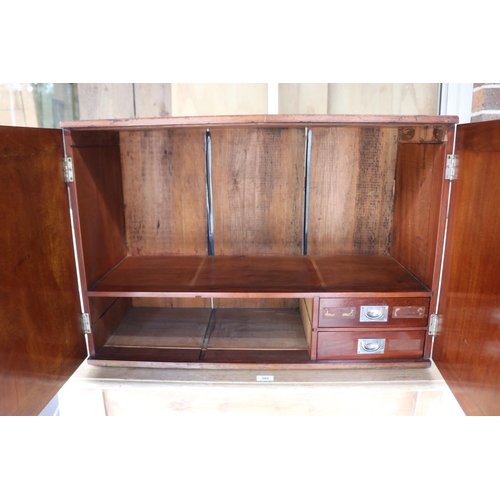 388 - Antique mahogany campaign stationary two door cabinet, fitted with two small internal drawers, iron ... 