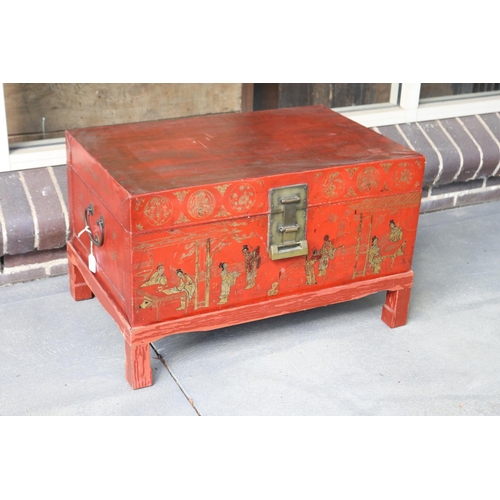 389 - Chinese red lacquer trunk with fitted base, approx 47cm H x 73cm W x 48cm D