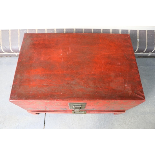 389 - Chinese red lacquer trunk with fitted base, approx 47cm H x 73cm W x 48cm D