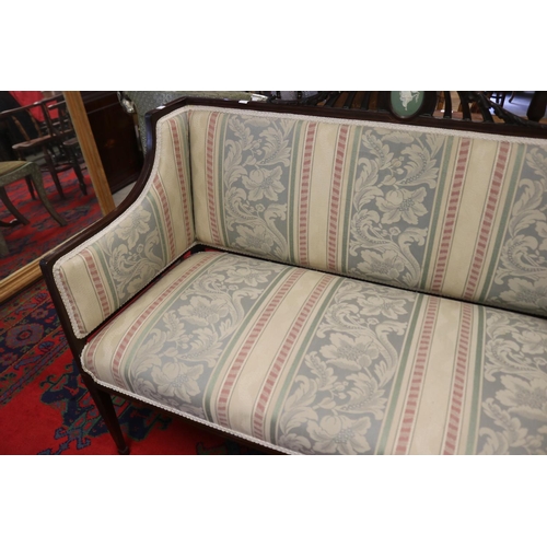 60 - Petit Sheraton revival inlaid rosewood two seater settee, the carved pierced back crest set with an ... 