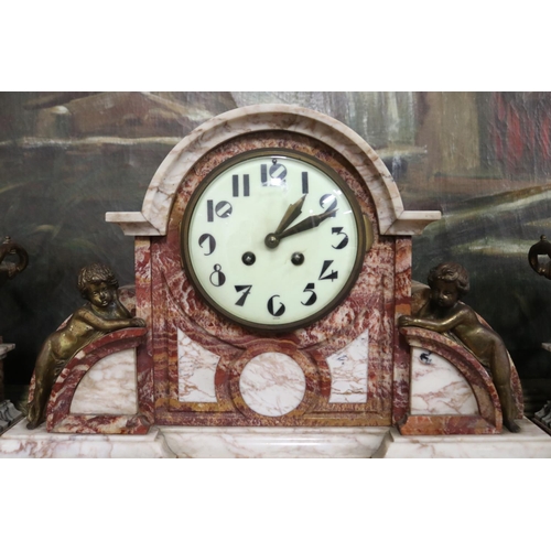 12 - Antique French marble mantle clock and garnitures, comprising a large tri colour marble clock with a... 