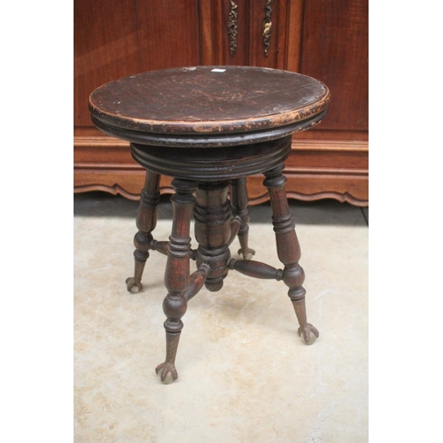 436 - Antique revolving piano stool, with metal and glass ball feet, approx 47cm H x 37cm Dia