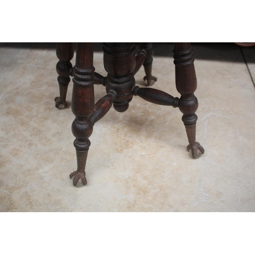 436 - Antique revolving piano stool, with metal and glass ball feet, approx 47cm H x 37cm Dia