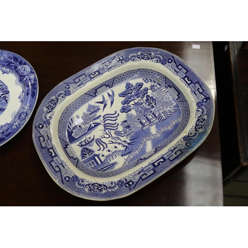 451 - Three large antique English blue & white platters, approx 46cm x 36cm and smaller (3)