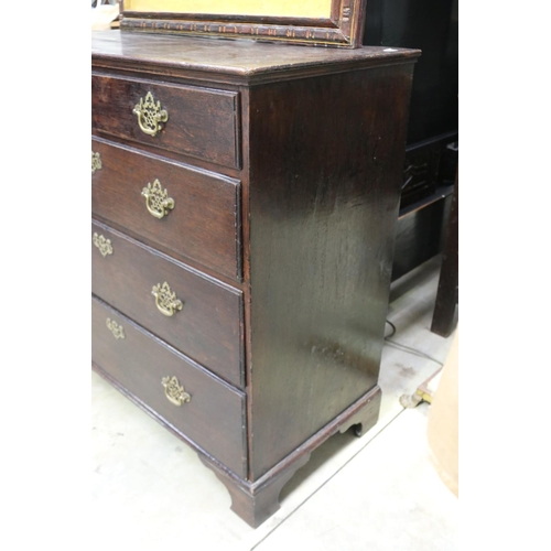 453 - Antique English oak five drawer country chest, fitted with pierced brass drop bale handles, all stan... 