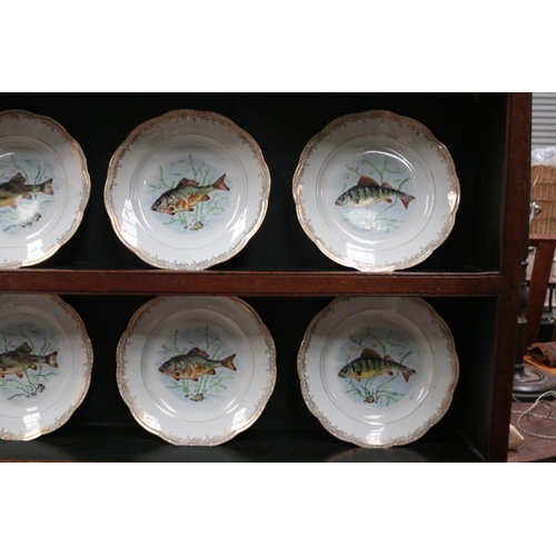 513 - French porcelain fish service, comprising set of 12 plates, each decorated with various species of f... 