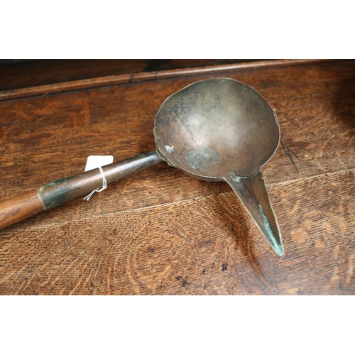 515 - Antique French copper pouring ladle fitted turned oak handled, approx 47cm L