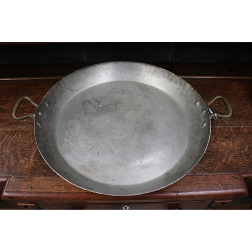 517 - Large heavy French circular twin handled copper shallow pan, with brass handles, impressed made in F... 