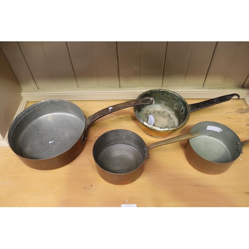 464 - Antique French copper fry pan and two smaller saucepans along with a brass pan, approx 23cm Dia excl... 