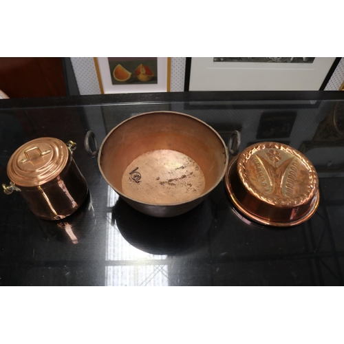 562 - Assortment of French copper , smaller twin hand pan, lidded pot and a pressed pattern pan, approx 12... 