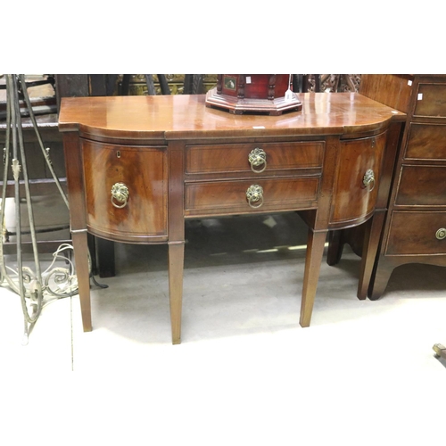 445 - Antique English mahogany bow front sideboard, with ebony stringing, standing on square tapering legs... 