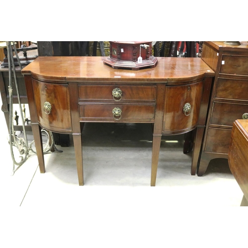 445 - Antique English mahogany bow front sideboard, with ebony stringing, standing on square tapering legs... 