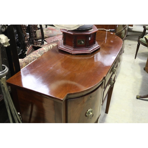 445 - Antique English mahogany bow front sideboard, with ebony stringing, standing on square tapering legs... 