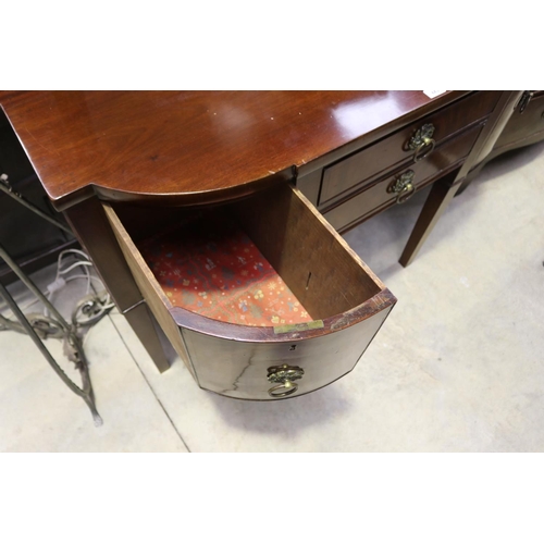 445 - Antique English mahogany bow front sideboard, with ebony stringing, standing on square tapering legs... 