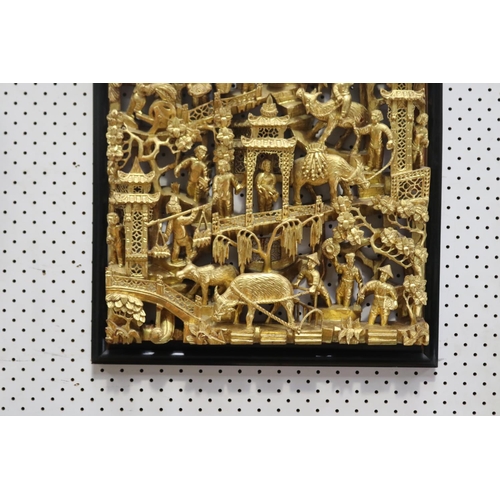 525 - Fine quality Asian gilt pierced and carved wood temple panel, showing cascading musicians, dancers, ... 