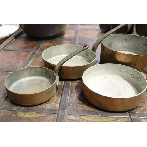 403 - Good set of antique French heavy gauge copper saucepans with wrought iron handles, approx 27cm Dia e... 