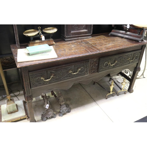 438 - Antique 18th century English oak two height country dresser, carved front two drawer base, with shap... 