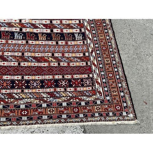584 - Handknotted wool carpet, multi banded geometric Kilim, approx 276cm x 182cm
