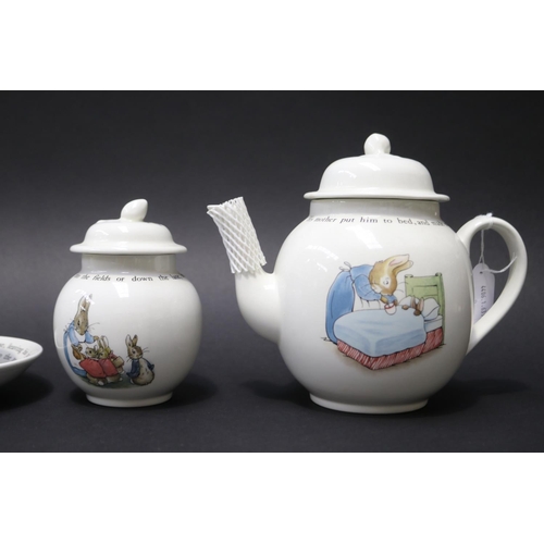 5003 - Wedgwood Peter Rabbit teapot, cream jug, sugar cup and saucer, approx 18cm H and shorter