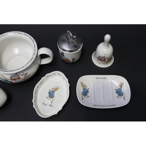 5008 - Assortment of Wedgwood Peter Rabbit egg trinket, dishes, egg coddler, potty and bell, approx 18cm W ... 