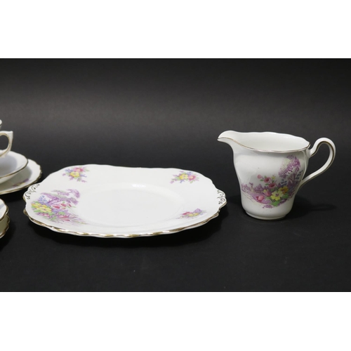 5029 - Colcough part service for five plus extras, tea cups, saucers, plates, jug and cake plate