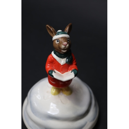 5067 - Royal Doulton Bunnykin Musical box Silent Night, attached Carol singer figure, approx 14cm H