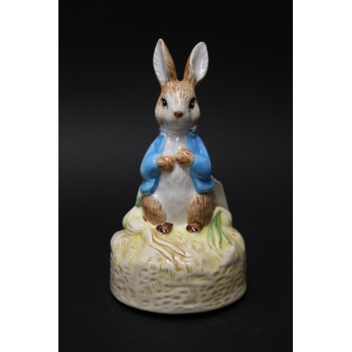 5113 - Beatrix potter Musical collectable Schmid Peter Cotton Tail needs attention along with a Wedgwood bo... 