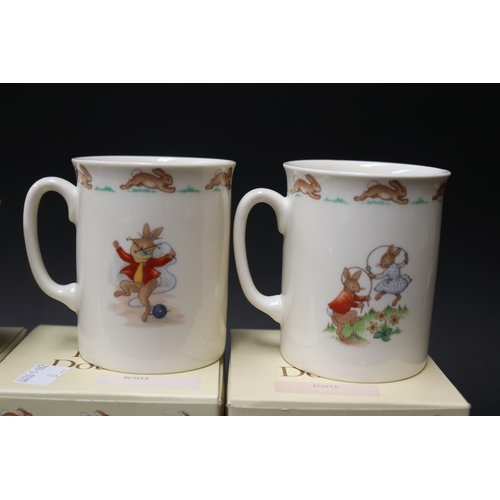 5237 - Four Royal Doulton mugs and a money box, approx 8cm H and shorter (5)