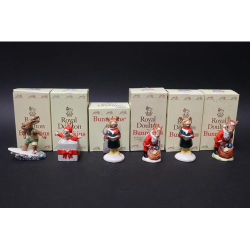 5244 - Royal Doulton two Bunnykins Santa, two Carol Singers, Aussie Surfer, Christmas Surprise, approx 11cm... 